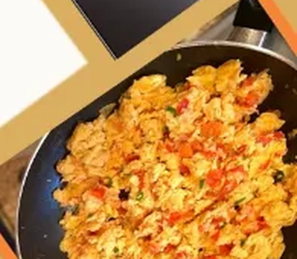 Egg silese, scrambled eggs with tomato and onion